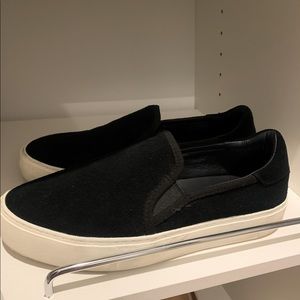 UGG black slip on platform sneakers
